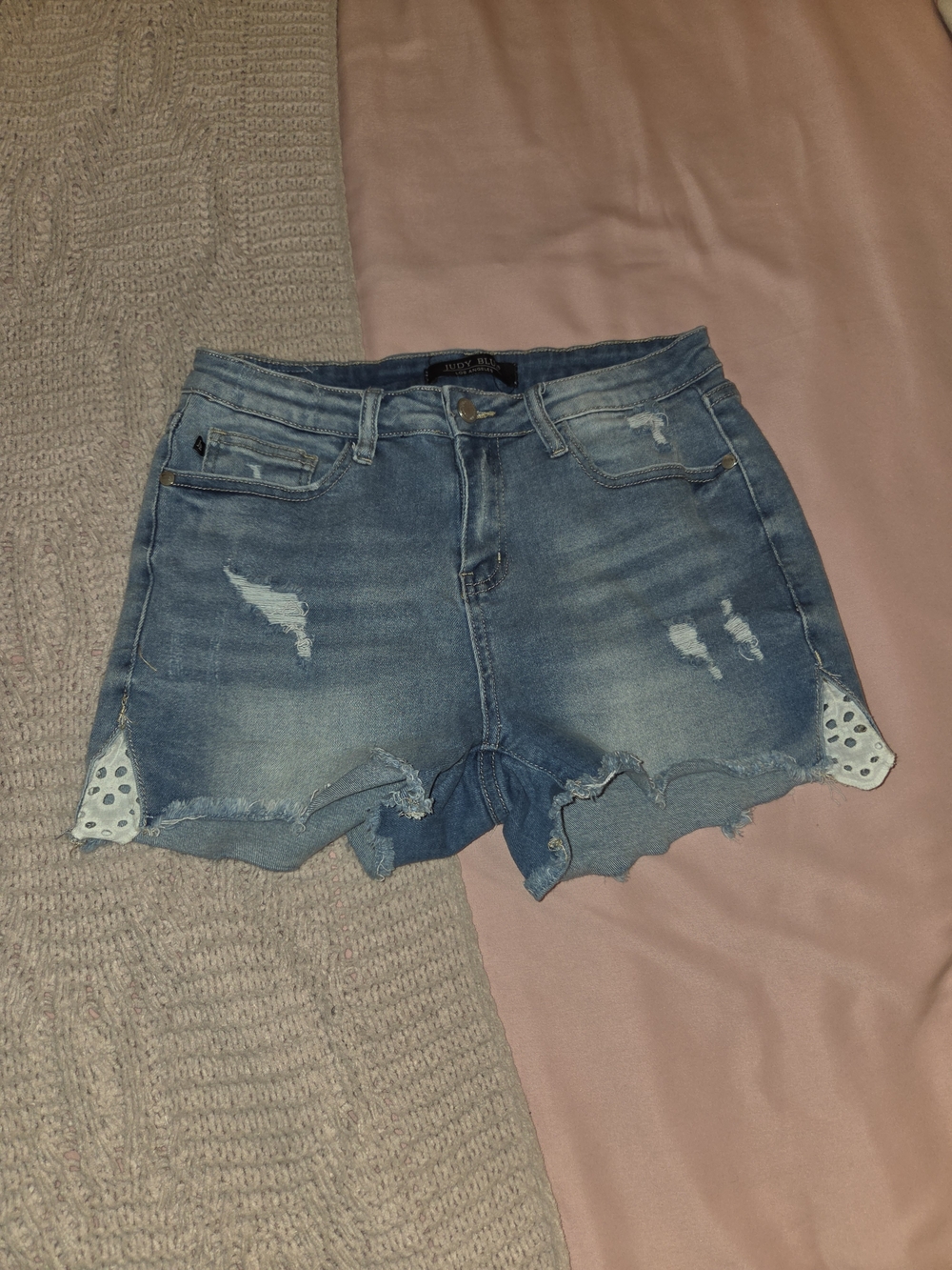 Distressed Light Blue Denim Shorts with Scalloped Hem